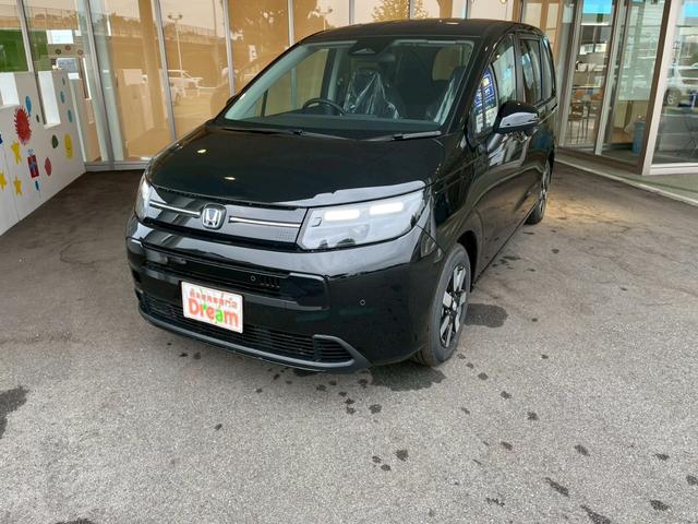 フリード e:HEVエアー EX 登録済未使用車 両側電動スライドドア HondaSENSING 純正アルミホイール アダプティブクルーズコントロール 禁煙車 電子パーキング オートブレーキホールド シートヒーター 電動格納式ミラー(6枚目)