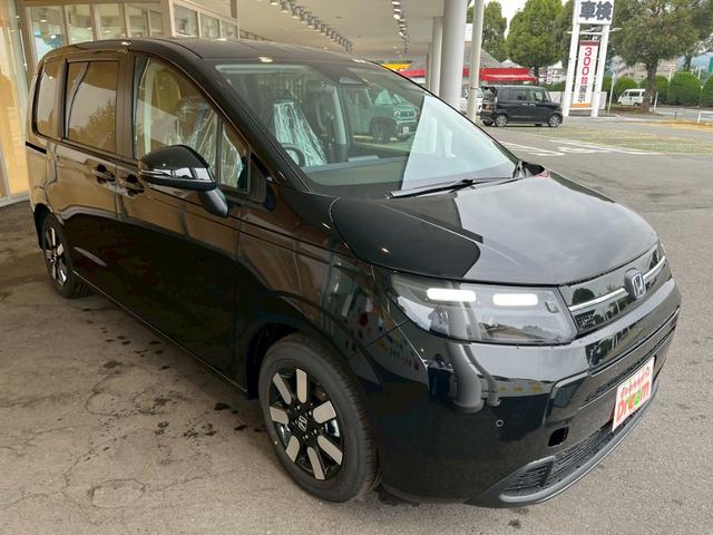 フリード e:HEVエアー EX 登録済未使用車 両側電動スライドドア HondaSENSING 純正アルミホイール アダプティブクルーズコントロール 禁煙車 電子パーキング オートブレーキホールド シートヒーター 電動格納式ミラー(8枚目)