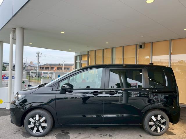 フリード e:HEVエアー EX 登録済未使用車 両側電動スライドドア HondaSENSING 純正アルミホイール アダプティブクルーズコントロール 禁煙車 電子パーキング オートブレーキホールド シートヒーター 電動格納式ミラー(10枚目)