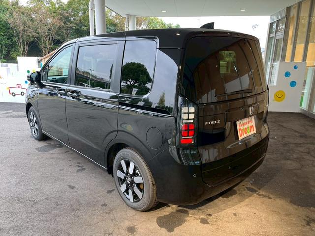 フリード e:HEVエアー EX 登録済未使用車 両側電動スライドドア HondaSENSING 純正アルミホイール アダプティブクルーズコントロール 禁煙車 電子パーキング オートブレーキホールド シートヒーター 電動格納式ミラー(11枚目)