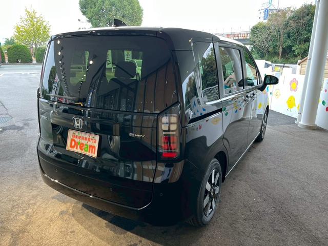 フリード e:HEVエアー EX 登録済未使用車 両側電動スライドドア HondaSENSING 純正アルミホイール アダプティブクルーズコントロール 禁煙車 電子パーキング オートブレーキホールド シートヒーター 電動格納式ミラー(13枚目)