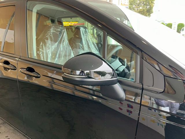 フリード e:HEVエアー EX 登録済未使用車 両側電動スライドドア HondaSENSING 純正アルミホイール アダプティブクルーズコントロール 禁煙車 電子パーキング オートブレーキホールド シートヒーター 電動格納式ミラー(17枚目)