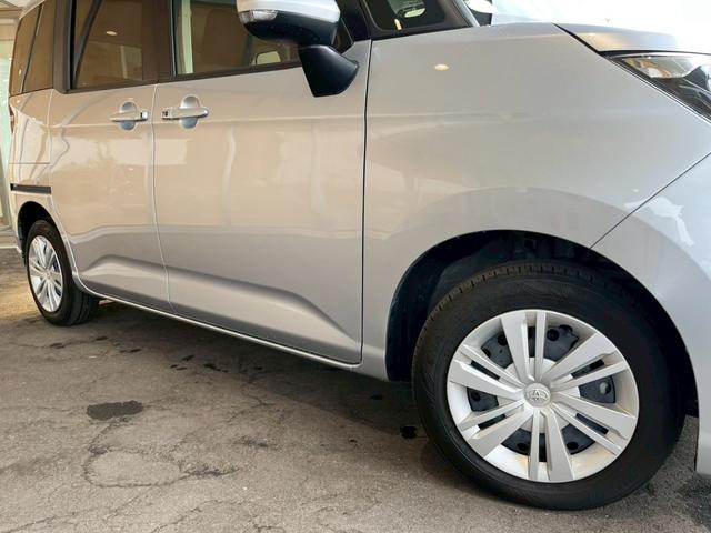 ルーミー G 純正ナビ バックカメラ Bluetooth接続 両側電動スライドドア 衝突被害軽減ブレーキ パーキングセンサー ステアリングスイッチ 前席シートヒーター シートバックテーブル USB充電 スマートキー(23枚目)