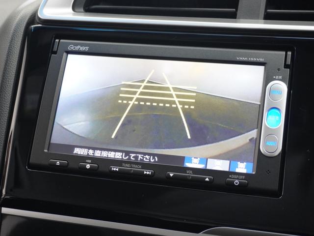 フィット １３Ｇ・Ｌパッケージ　１年保証ナビＲカメＥＴＣワンセグＢＴ接続ＬＥＤ　禁煙　１オ－ナ－　Ｂカメ　Ｓキー　ワンセグ　フルオートエアコン　整備記録簿　ナビＴＶ　リモコンキー　横滑り防止機能　エアバック　アイスト　ＥＴＣ付き（3枚目）