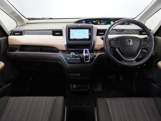 フリードハイブリッド ハイブリッド・Gホンダセンシング 1年保証ナビRカメETC両電扉BT地デジLED 軽減ブレーキ キーフリーシステム 1オ-ナ- 記録簿 DVD再生可能 ECON 禁煙 メモリーナビ 後カメラ Aクルーズ 地デジフルセグTV 横滑防止(7枚目)