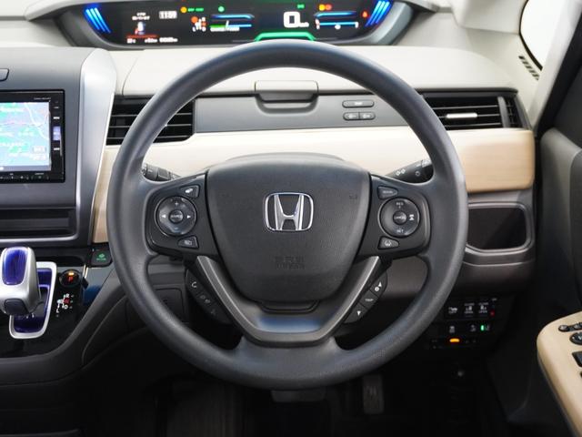 フリードハイブリッド ハイブリッド・Gホンダセンシング 1年保証ナビRカメETC両電扉BT地デジLED 軽減ブレーキ キーフリーシステム 1オ-ナ- 記録簿 DVD再生可能 ECON 禁煙 メモリーナビ 後カメラ Aクルーズ 地デジフルセグTV 横滑防止(8枚目)