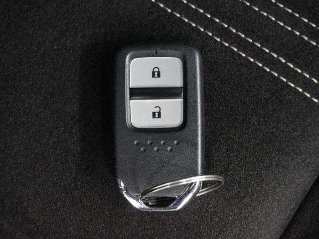 ヴェゼル ハイブリッドRS・ホンダセンシング 1年保証ナビRカメETC地デジBTパドルシフト ETC付 1オ-ナ- 定期点検記録簿 デュアルエアコン サイドSRS Rカメ フルオートエアコン 禁煙 両席エアバック スマキー TVナビ 横滑り防止(18枚目)