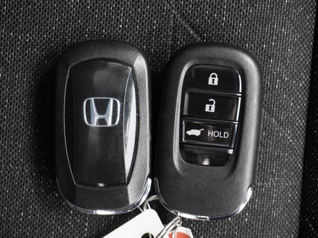 ヴェゼル e:HEVZ 1年保証ナビ全周囲カメDレコETC2.0クルコン 衝突回避支援ブレーキ機能 パノラミックビューモニター 1オナ スマキ Pトランク フルオートエアコン エアバッグ 両席エアバック Rカメ 記録簿付(24枚目)