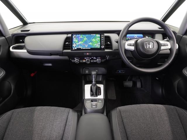 フィット e:HEVホーム 2年保証ナビRカメETCクルコンBT地デジ 前後誤発進抑制機能 クリソナ 助手席エアバッグ 運転席エアバッグ 1オナ アイドリングストップ 禁煙 LEDライト バックカメラ ABS サイドエアバッグ(6枚目)