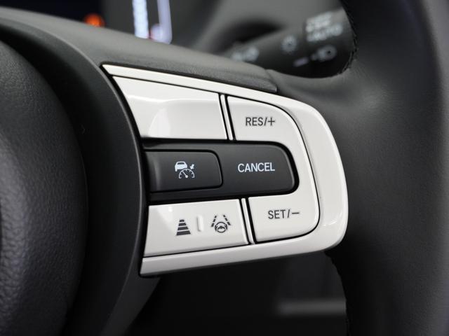 フィット e:HEVホーム 2年保証ナビRカメETCクルコンBT地デジ 前後誤発進抑制機能 クリソナ 助手席エアバッグ 運転席エアバッグ 1オナ アイドリングストップ 禁煙 LEDライト バックカメラ ABS サイドエアバッグ(8枚目)