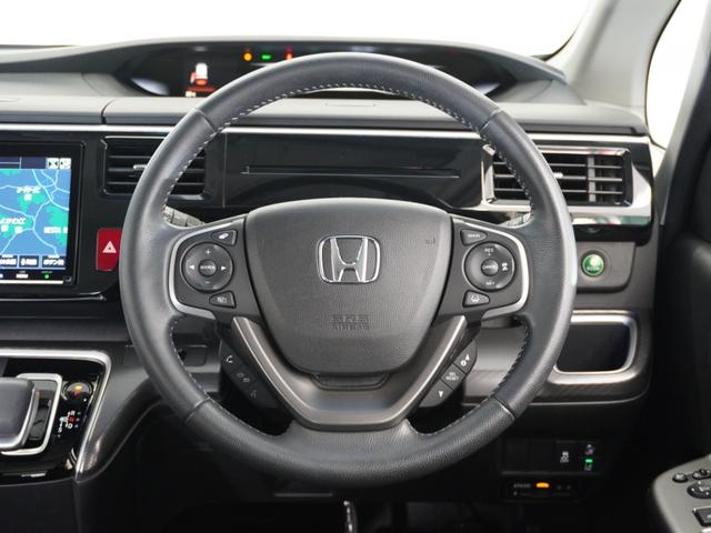 ステップワゴンスパーダ ｅ：ＨＥＶスパーダＧホンダセンシング　１年保証ナビＤレコＲカメＥＴＣ両電扉ＢＴ地デジ　ＬＥＤライト　ドライブレコーダ　セキュリティアラーム　横滑り防止装置　クルーズコントロール　Ｂカメラ　フルセグ　ＤＶＤ再生可能　ナビ＆ＴＶ　キーレス（10枚目）