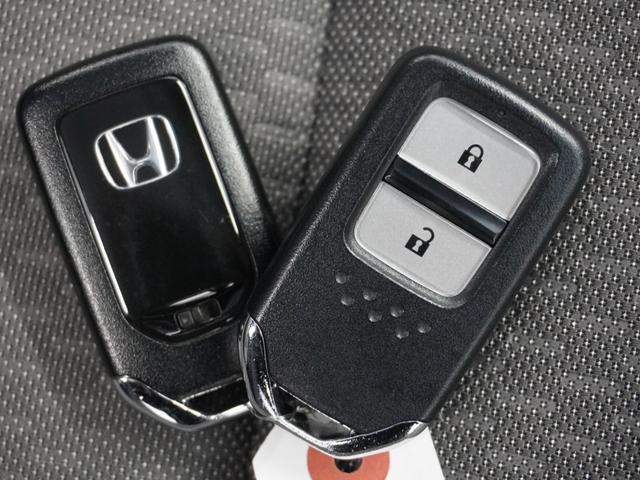 フィット e:HEVクロスター 1年保証ナビRカメETCクルコンBT地デジLED 衝突回避システム 禁煙 1オーナー フルオートエアコン 整備記録簿 前後センサー LEDランプ エアバッグ サイドエアバック VSA バックカメラ(16枚目)