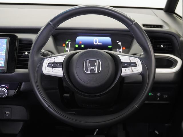 フィット e:HEVホーム 2年保証ナビDレコRカメETCクルコンBT地デジ 前後誤発進抑制機能 クリソナ 助手席エアバッグ 運転席エアバッグ 1オナ アイドリングストップ 禁煙 LEDライト バックカメラ ABS フルセグTV(9枚目)