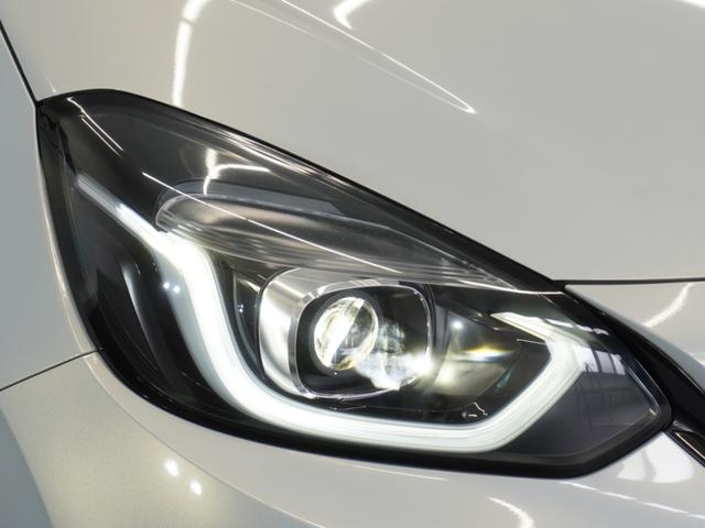 フィット e:HEVホーム 2年保証ナビDレコRカメETCクルコンBT地デジ 前後誤発進抑制機能 クリソナ 助手席エアバッグ 運転席エアバッグ 1オナ アイドリングストップ 禁煙 LEDライト バックカメラ ABS フルセグTV(13枚目)