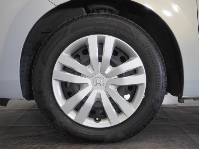 フィット e:HEVホーム 2年保証ナビDレコRカメETCクルコンBT地デジ 前後誤発進抑制機能 クリソナ 助手席エアバッグ 運転席エアバッグ 1オナ アイドリングストップ 禁煙 LEDライト バックカメラ ABS フルセグTV(17枚目)