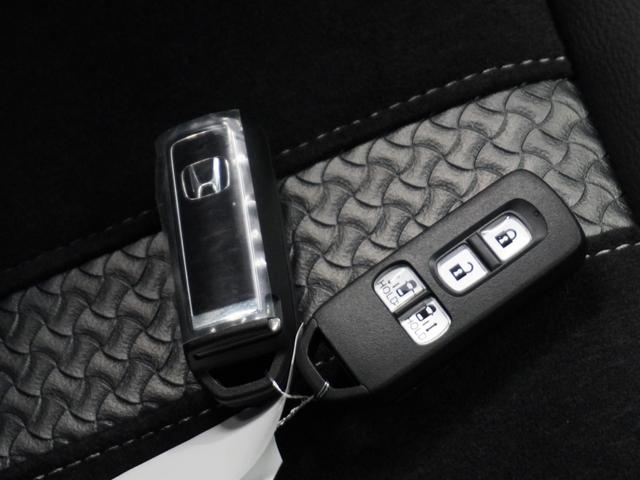 N-BOXカスタム EXターボ 2年保証ナビDレコRカメETC両電扉BT地デジ パーキングセンサー 記録簿 1オーナー ドライブレコーダー 前席シートヒーター バックガイドモニター カーテンエアバック ETC装備 禁煙 LED(20枚目)