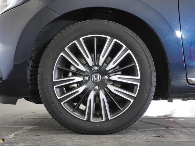 フィット ｅ：ＨＥＶリュクス　２年保証ナビＤレコＲカメＥＴＣクルコンＢＴ地デジ　誤発進抑制機能　Ｉオーナー　メモリーナビ　ＡＷ　リアカメラ　ＥＴＣ付　ＬＥＤ　シートヒーター　クルーズコントロール　セキュリティアラーム　ＤＶＤ　禁煙（18枚目）