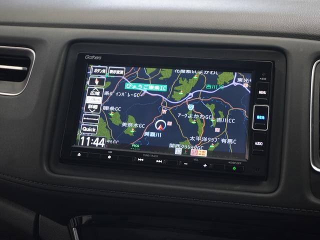 ヴェゼル ハイブリッドＺ・ホンダセンシング　１年保証ナビＤレコＲカメＥＴＣクルコンＢＴ地デジ　レーダーサポート　１オーナ－　ＤＶＤ再生機能　整備記録簿　横滑り防止システム　バックアイカメラ　盗難防止装置　フルセ　シートヒーター付　スマ－トキ－（2枚目）