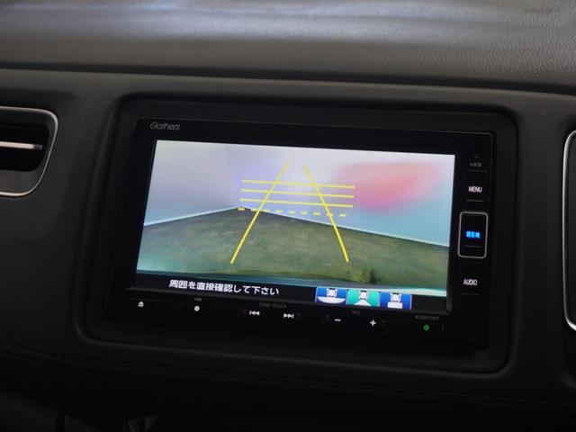 ヴェゼル ハイブリッドＺ・ホンダセンシング　１年保証ナビＤレコＲカメＥＴＣクルコンＢＴ地デジ　レーダーサポート　１オーナ－　ＤＶＤ再生機能　整備記録簿　横滑り防止システム　バックアイカメラ　盗難防止装置　フルセ　シートヒーター付　スマ－トキ－（3枚目）