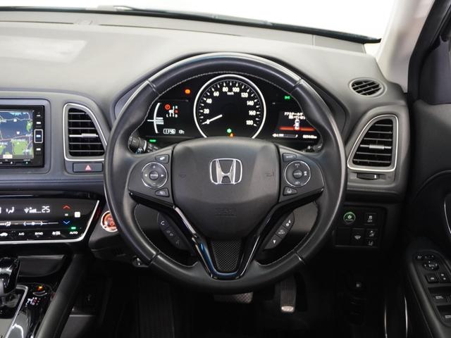 ヴェゼル ハイブリッドＺ・ホンダセンシング　１年保証ナビＤレコＲカメＥＴＣクルコンＢＴ地デジ　レーダーサポート　１オーナ－　ＤＶＤ再生機能　整備記録簿　横滑り防止システム　バックアイカメラ　盗難防止装置　フルセ　シートヒーター付　スマ－トキ－（9枚目）