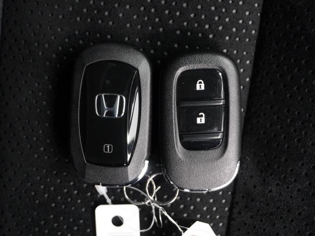 シビック ｅ：ＨＥＶＥＸ　２年保証当社試乗車ナビＤレコＲカメＥＴＣ地デジ　衝突被害軽減ブレーキ　Ｂカメラ　フルセグ　ＬＥＤヘッドライト　サイドカーテンエアバック　サンルーフ　オートライト　パーキングセンサー　ドラレコ　禁煙車（26枚目）
