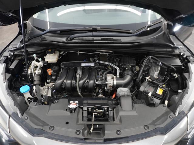 ヴェゼル ハイブリッドＺ・ホンダセンシング　１年保証ナビＲカメＥＴＣクルコンＢＴ地デジＬＥＤ　レーダーサポート　ＤＶＤ再生機能　整備記録簿　横滑り防止システム　バックアイカメラ　盗難防止装置　フルセ　シートヒーター付　スマ－トキ－　ＥＣＯモード（19枚目）