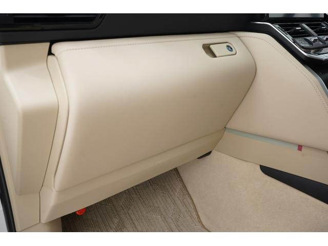 ランドクルーザー ZX サンルーフ/モデリスタエアロ/JBL/後席モニター/黒ルーフレール/クールBOX/寒冷地/Tコネクトナビ&マルチテレインモニター/電動リヤデフ/ベージュ革シート/指紋認証スタートスイッチ/ETC2.0(63枚目)