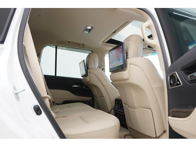 ランドクルーザー ZX サンルーフ/モデリスタエアロ/JBL/後席モニター/黒ルーフレール/クールBOX/寒冷地/Tコネクトナビ&マルチテレインモニター/電動リヤデフ/ベージュ革シート/指紋認証スタートスイッチ/ETC2.0(66枚目)