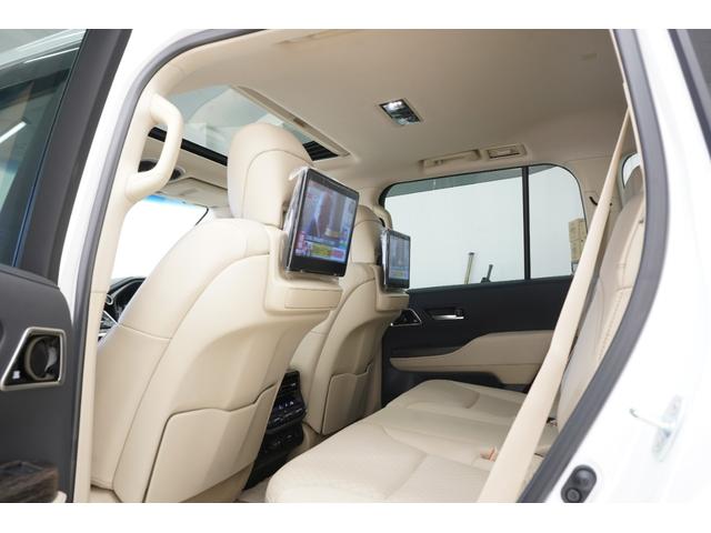 ランドクルーザー ZX サンルーフ/モデリスタエアロ/JBL/後席モニター/黒ルーフレール/クールBOX/寒冷地/Tコネクトナビ&マルチテレインモニター/電動リヤデフ/ベージュ革シート/指紋認証スタートスイッチ/ETC2.0(70枚目)