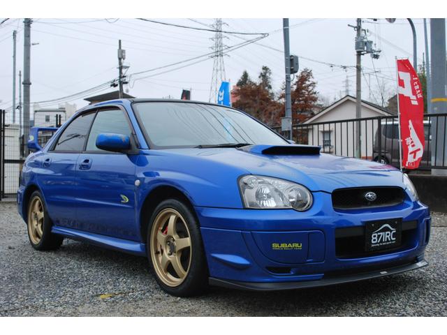 ＷＲＸ　２００４　Ｖリミテッド　修復歴無　アプライドＥ型　特別仕様車　専用スポーツシート　ＳＴＩマフラー　１７インチアルミ　キセノン　ＥＴＣ　Ｒスポイラー　タイミングベルト交換ステッカー有り　ＳＴＩゲノム追加メーター(10枚目)