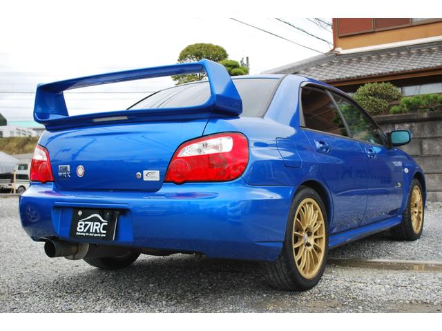 ＷＲＸ　２００３　Ｖリミテッド　修復歴無　ＯＺ１７アルミ　湾岸マフラー　タイミングベルト交換ステッカー有り　ナビフルセグ　キセノン　ＳＴＩシフトノブ　大型Ｒスポイラー　キセノン　純正ＭＯＭＯステアリング(7枚目)