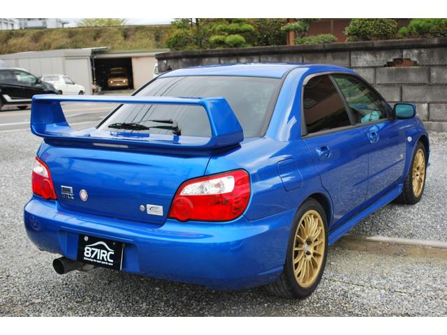 ＷＲＸ　２００３　Ｖリミテッド　修復歴無　ＯＺ１７アルミ　湾岸マフラー　タイミングベルト交換ステッカー有り　ナビフルセグ　キセノン　ＳＴＩシフトノブ　大型Ｒスポイラー　キセノン　純正ＭＯＭＯステアリング(15枚目)