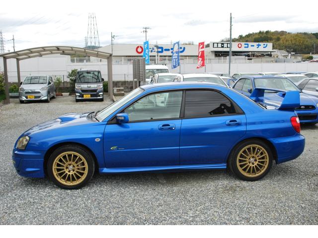 インプレッサ ＷＲＸ　２００３　Ｖリミテッド　修復歴無　ＯＺ１７アルミ　湾岸マフラー　タイミングベルト交換ステッカー有り　ナビフルセグ　キセノン　ＳＴＩシフトノブ　大型Ｒスポイラー　キセノン　純正ＭＯＭＯステアリング（20枚目）