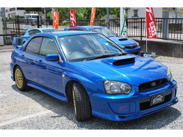 インプレッサ ＷＲＸ　ＳＴｉ　修復歴無　タイミングベルト９８９４９Ｋｍ時交換済　ＯＺ１７アルミ　フジツボマフラー　　記録簿Ｒ１・Ｒ３・Ｒ５有り　純正ＯＰエアロ　キセノン　キーレス　Ｒスポイラー　Ｄｅｆｉブーストメーター　ブレンボ（22枚目）