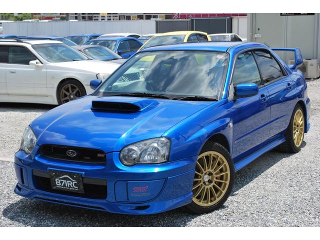 インプレッサ ＷＲＸ　ＳＴｉ　修復歴無　タイミングベルト９８９４９Ｋｍ時交換済　ＯＺ１７アルミ　フジツボマフラー　　記録簿Ｒ１・Ｒ３・Ｒ５有り　純正ＯＰエアロ　キセノン　キーレス　Ｒスポイラー　Ｄｅｆｉブーストメーター　ブレンボ（23枚目）