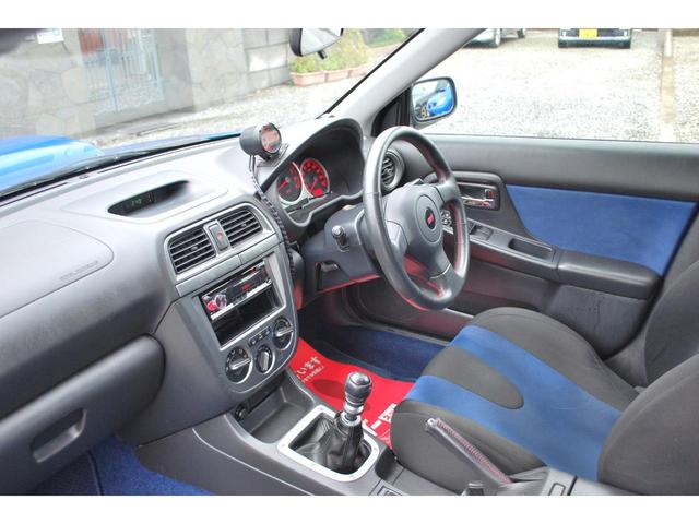 インプレッサ ＷＲＸ　ＳＴｉ　修復歴無　タイミングベルト９８９４９Ｋｍ時交換済　ＯＺ１７アルミ　フジツボマフラー　　記録簿Ｒ１・Ｒ３・Ｒ５有り　純正ＯＰエアロ　キセノン　キーレス　Ｒスポイラー　Ｄｅｆｉブーストメーター　ブレンボ（34枚目）