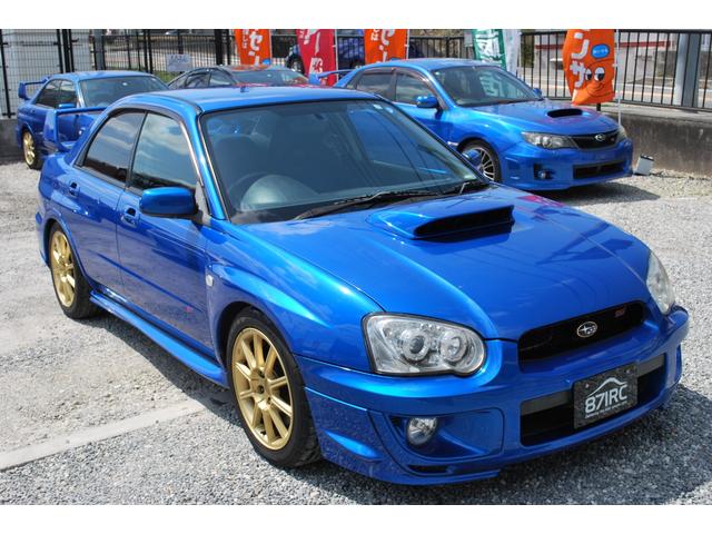 インプレッサ ＷＲＸ　ＳＴｉ　修復歴無　タイミングベルト１１８６４３ｋｍ時交換ステッカー有り　ブリッツ車高調　外マフラー　カロッツェリアディプレイオーディオ　バックカメラ　純正１７アルミ　純正ブレンボ　キセノン　ＤＣＣＤ　Ｒスポ（18枚目）