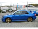 ＷＲＸ　２００３　Ｖリミテッド　修復歴無　ＯＺ１７アルミ　湾岸マフラー　タイミングベルト交換ステッカー有り　ナビフルセグ　キセノン　ＳＴＩシフトノブ　大型Ｒスポイラー　キセノン　純正ＭＯＭＯステアリング（20枚目）