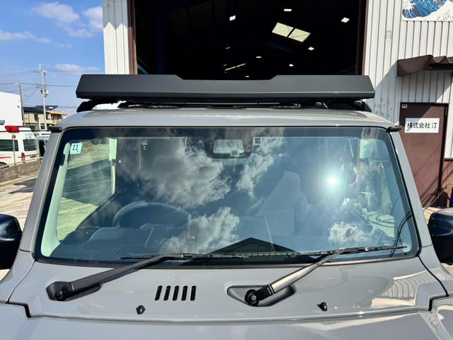 ジムニー ＸＣ　ワンオーナー　カスタム使用（キャリア・１６インチブロックタイヤ）　デュアルセンサーブレーキサポート　ドラレコ　シートヒーター　レーンキープアシスト　Ｐスタート　後席シートベルトリマインダー　背面タイヤ（10枚目）