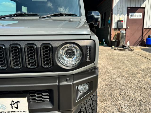 ジムニー ＸＣ　ワンオーナー　カスタム使用（キャリア・１６インチブロックタイヤ）　デュアルセンサーブレーキサポート　ドラレコ　シートヒーター　レーンキープアシスト　Ｐスタート　後席シートベルトリマインダー　背面タイヤ（12枚目）