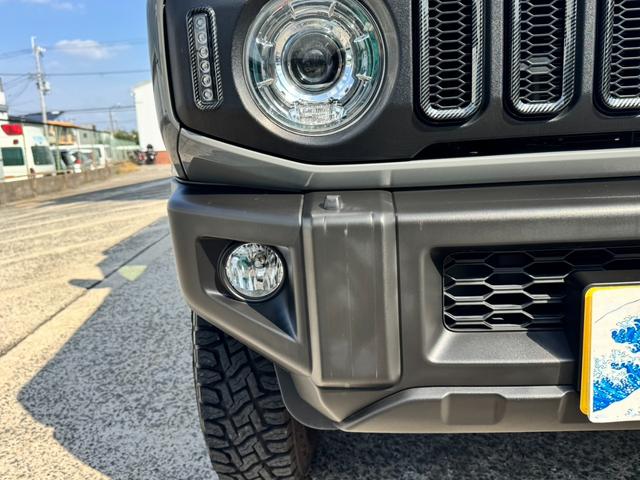 ジムニー ＸＣ　ワンオーナー　カスタム使用（キャリア・１６インチブロックタイヤ）　デュアルセンサーブレーキサポート　ドラレコ　シートヒーター　レーンキープアシスト　Ｐスタート　後席シートベルトリマインダー　背面タイヤ（13枚目）