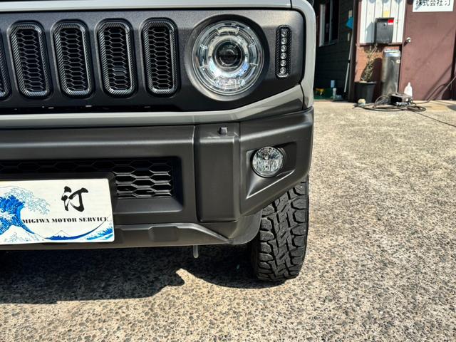 ジムニー ＸＣ　ワンオーナー　カスタム使用（キャリア・１６インチブロックタイヤ）　デュアルセンサーブレーキサポート　ドラレコ　シートヒーター　レーンキープアシスト　Ｐスタート　後席シートベルトリマインダー　背面タイヤ（14枚目）