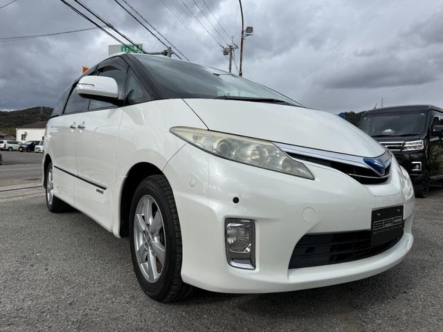 エスティマハイブリッド Ｇ　純正ＨＤＤナビ　バックカメラ　フリップダウンモニター　前後ドラレコ　両側パワースライドドア　ＨＩＤ　Ｗオートエアコン　ＥＴＣ　ＡＣ１００Ｖ電源　クルーズコントロール　クリアランスソナー　ＥＴＣ（2枚目）