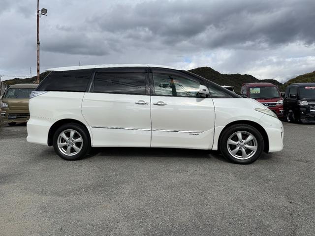 エスティマハイブリッド Ｇ　純正ＨＤＤナビ　バックカメラ　フリップダウンモニター　前後ドラレコ　両側パワースライドドア　ＨＩＤ　Ｗオートエアコン　ＥＴＣ　ＡＣ１００Ｖ電源　クルーズコントロール　クリアランスソナー　ＥＴＣ（3枚目）