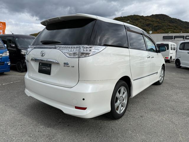 エスティマハイブリッド Ｇ　純正ＨＤＤナビ　バックカメラ　フリップダウンモニター　前後ドラレコ　両側パワースライドドア　ＨＩＤ　Ｗオートエアコン　ＥＴＣ　ＡＣ１００Ｖ電源　クルーズコントロール　クリアランスソナー　ＥＴＣ（4枚目）