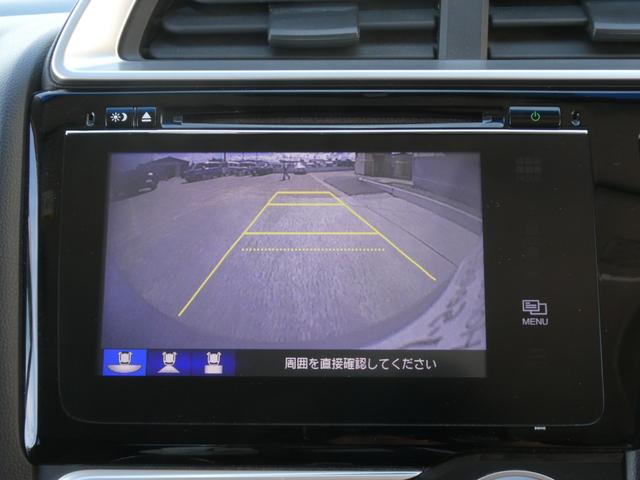 フィット １３Ｇ・Ｆパッケージ　ワンオーナー　７インチメモリーナビ　バックカメラ　ＥＴＣ　Ｂｌｕｅｔｏｏｔｈ　ＵＳＢ入力端子　スマートキー　スマートキー　マニュアルエアコン　フルセグ　ＣＤ　ＤＶＤ　アイドリングストップ　禁煙車（4枚目）