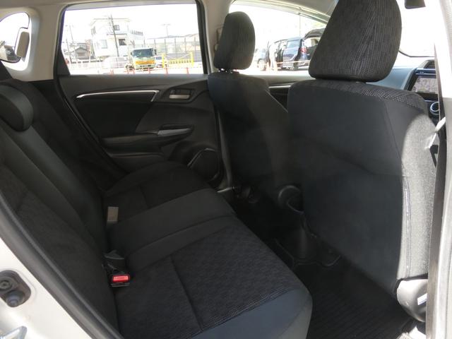 フィット １３Ｇ・Ｆパッケージ　ワンオーナー　７インチメモリーナビ　バックカメラ　ＥＴＣ　Ｂｌｕｅｔｏｏｔｈ　ＵＳＢ入力端子　スマートキー　スマートキー　マニュアルエアコン　フルセグ　ＣＤ　ＤＶＤ　アイドリングストップ　禁煙車（53枚目）