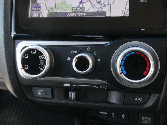 フィット １３Ｇ・Ｆパッケージ　ワンオーナー　７インチメモリーナビ　バックカメラ　ＥＴＣ　Ｂｌｕｅｔｏｏｔｈ　ＵＳＢ入力端子　スマートキー　スマートキー　マニュアルエアコン　フルセグ　ＣＤ　ＤＶＤ　アイドリングストップ　禁煙車（64枚目）