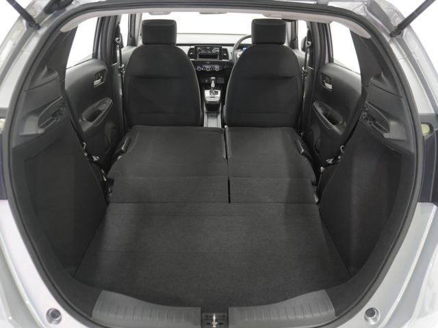 フィット ベーシック　ワンオーナー　ＣＤチューナー　ＥＴＣ　マニュアルエアコン　パワーウインドウ　パワースライド　スマートキー　電動格納ドアミラー　盗難防止装置　横滑り防止装置　アイドリングストップ　ＡＢＳ　禁煙車（11枚目）