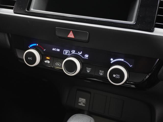 フィット ベーシック　ワンオーナー　ＣＤチューナー　ＥＴＣ　マニュアルエアコン　パワーウインドウ　パワースライド　スマートキー　電動格納ドアミラー　盗難防止装置　横滑り防止装置　アイドリングストップ　ＡＢＳ　禁煙車（56枚目）